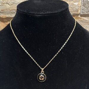 Gold-Tone Pendant Necklace with Black interlocking GG Enamel Disc